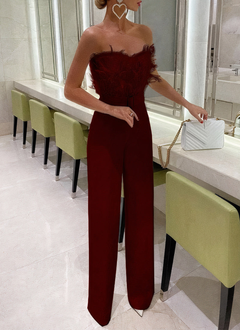 Arika | Tuta elegante con top di piume