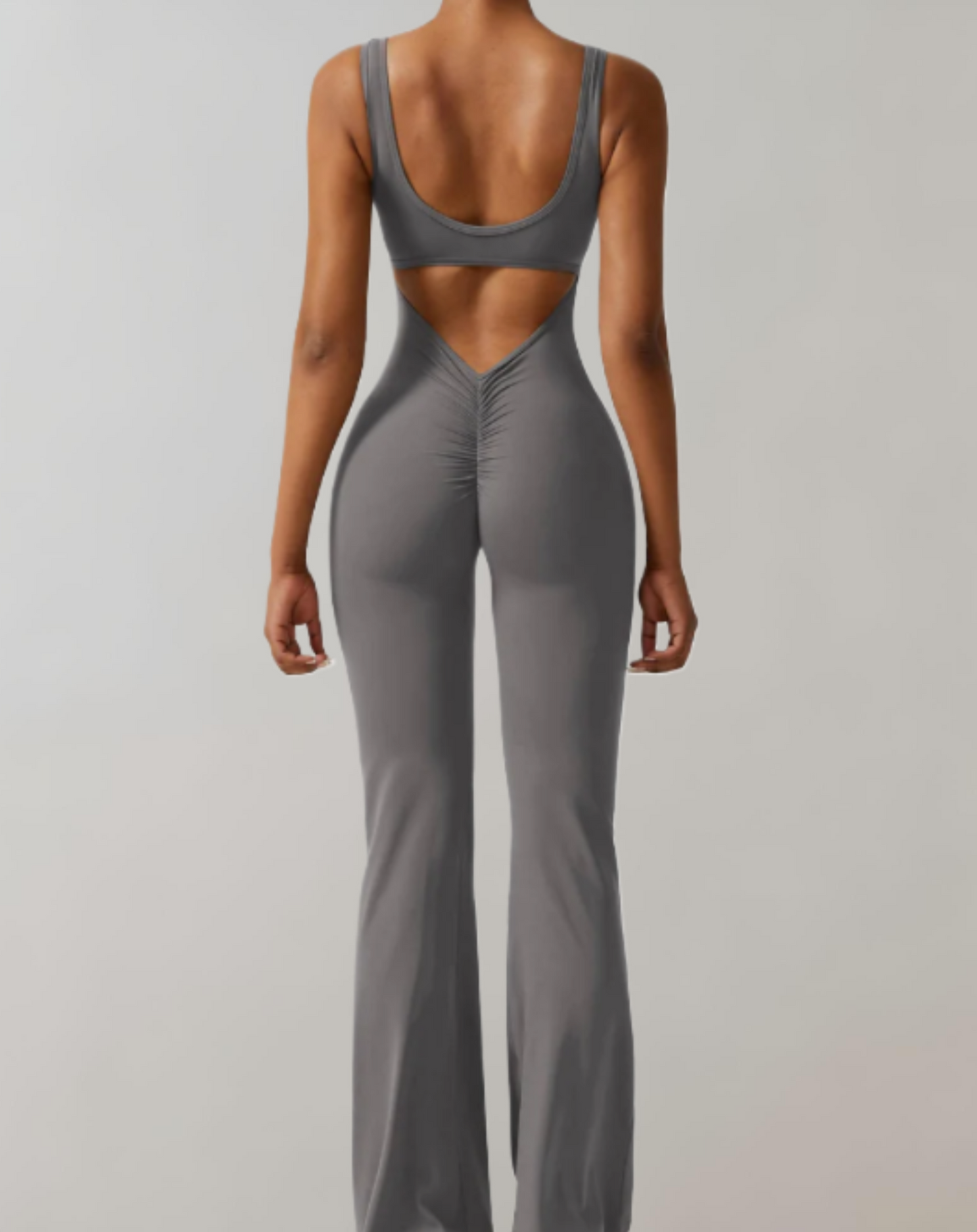 Clémence - Bodycon kombinezon z dekoltem w szpic i spodnie z dzwoneczkami